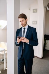 Business owner improving lead response time by replying from a mobile phone
